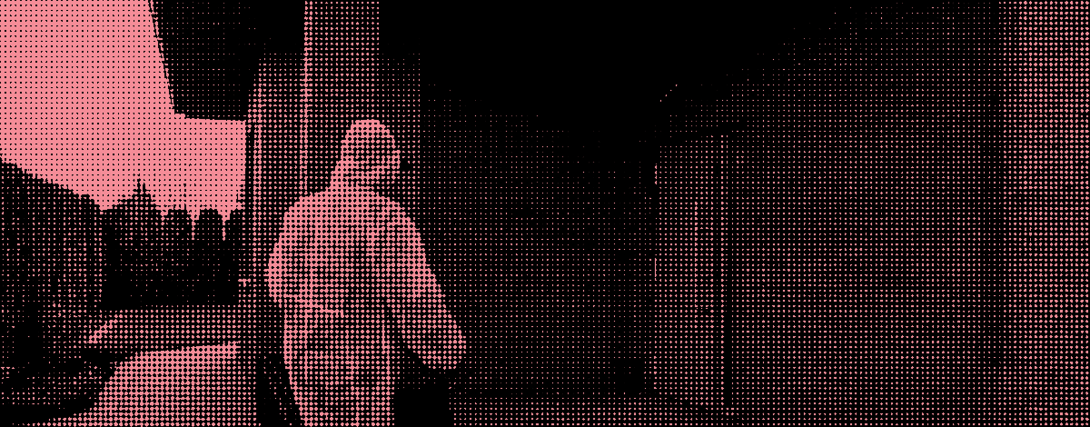 service technician in work clothes entering a building